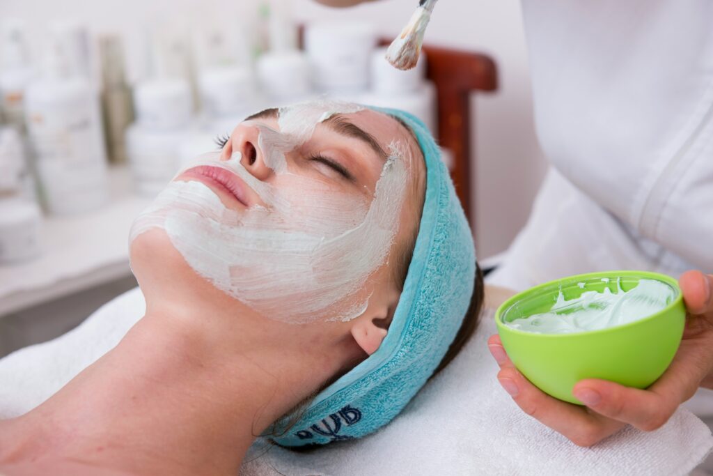 a woman receiving a facial treatment at levansha nail and beauty clinic